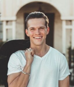 man-in-white-v-neck-t-shirt-and-black-pants-775358